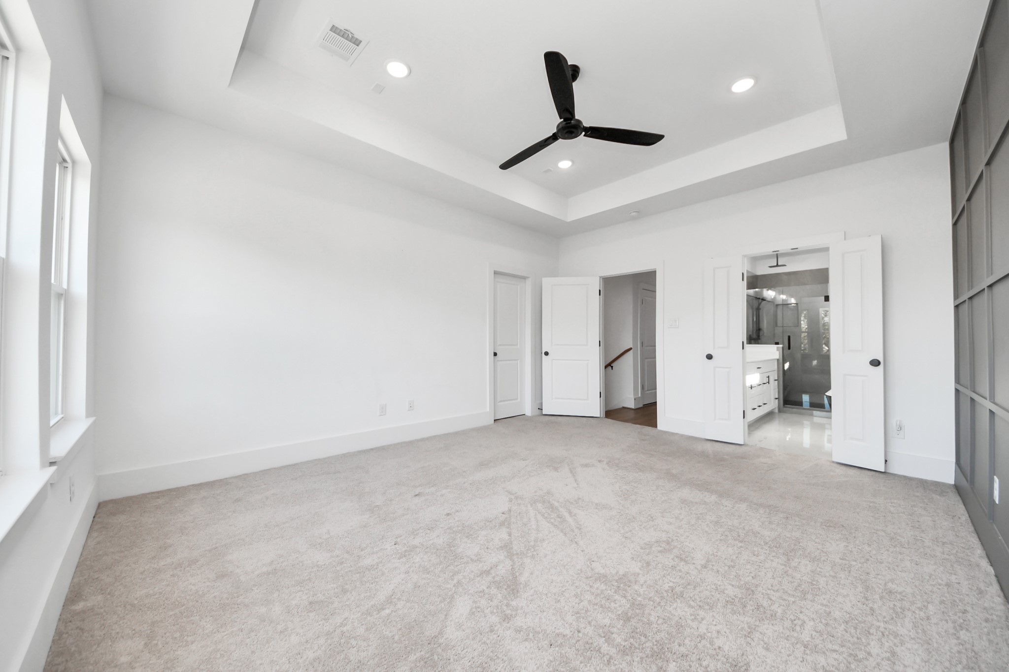 4806 Cochran Street Houston, TX 77009 - Photo 27 of 43 an empty room with a ceiling fan and window