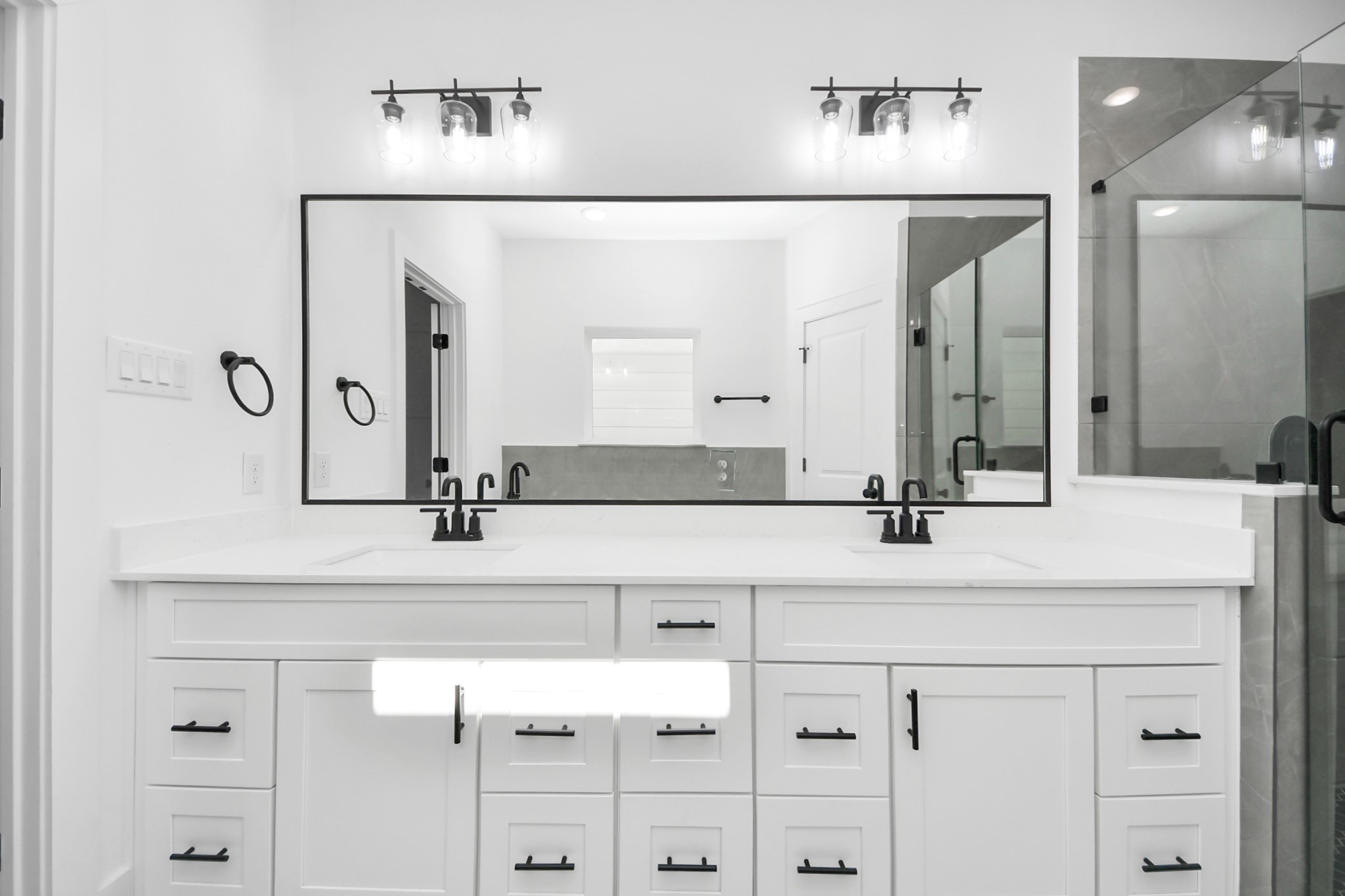 4806 Cochran Street Houston, TX 77009 - Photo 29 of 43 a bathroom with a sink and a mirror