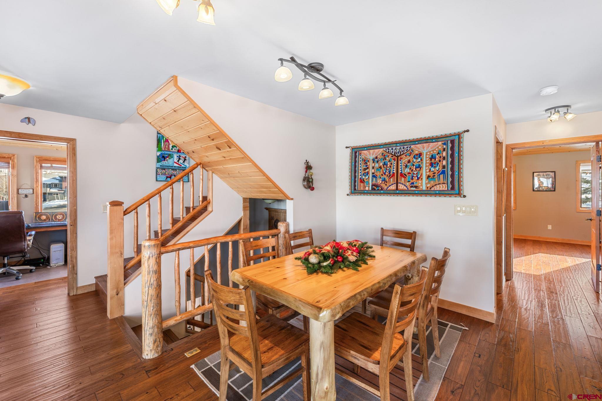 10 Ruby Drive Crested Butte, CO 81225 - Photo 16 of 42 a view of a dining room with furniture and wooden floor