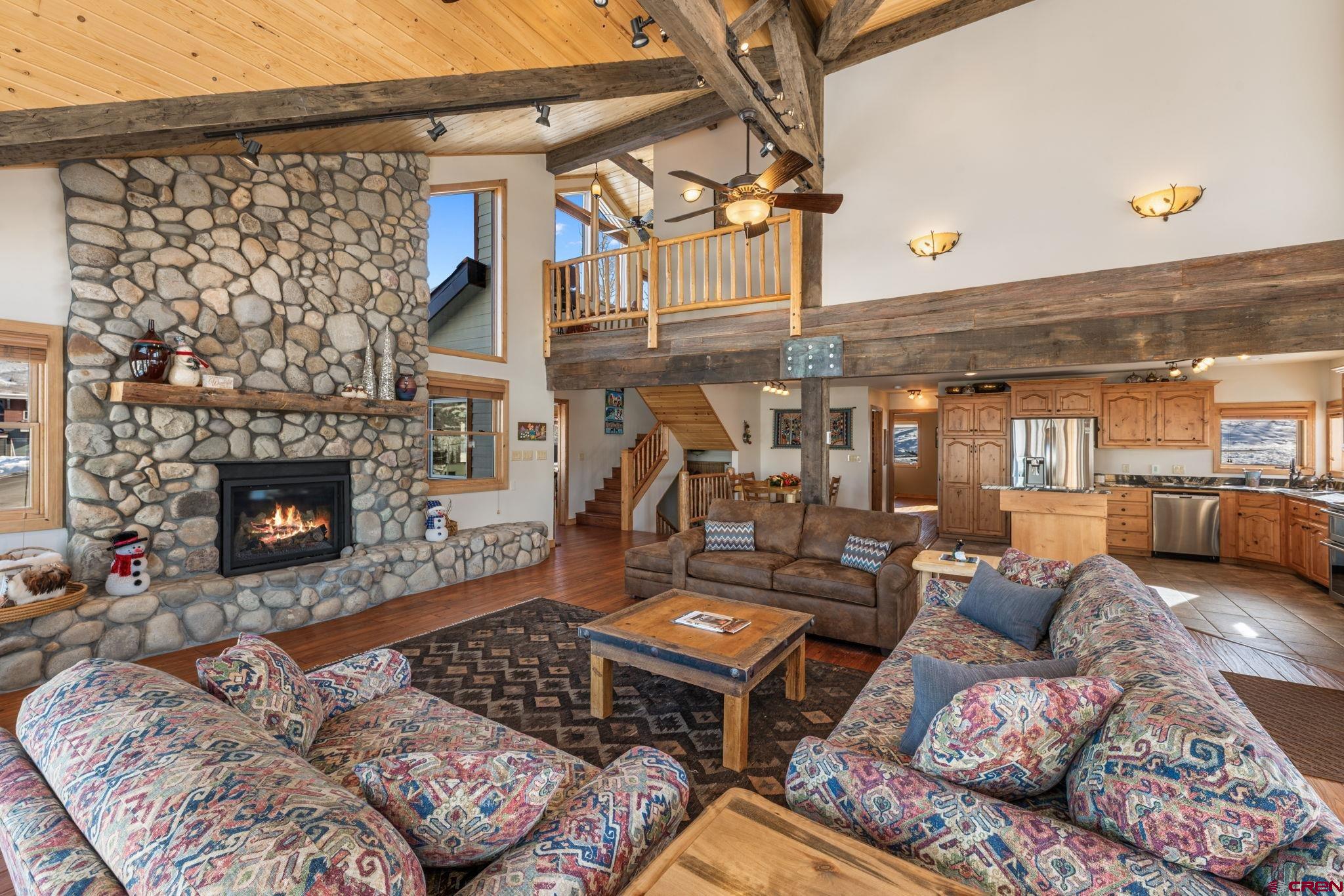 10 Ruby Drive Crested Butte, CO 81225 - Photo 7 of 42 a living room with furniture and a fireplace