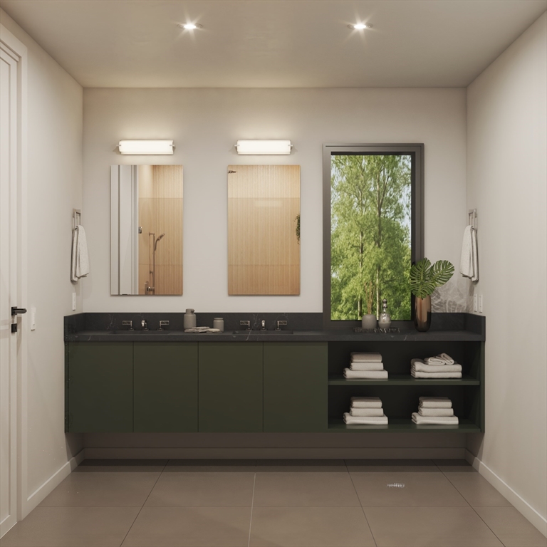 17 Algonquin Road, Unit 2 Newton, MA 02467 - Photo 11 of 18 a bathroom with a bathtub and a window