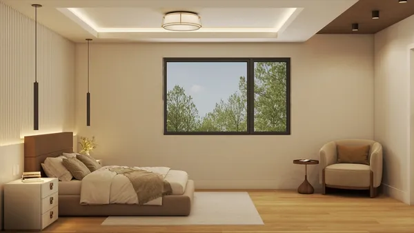 a bedroom with furniture and a window