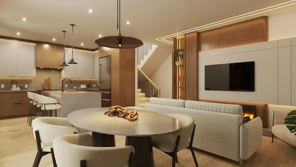 a kitchen with a table chairs sink and microwave