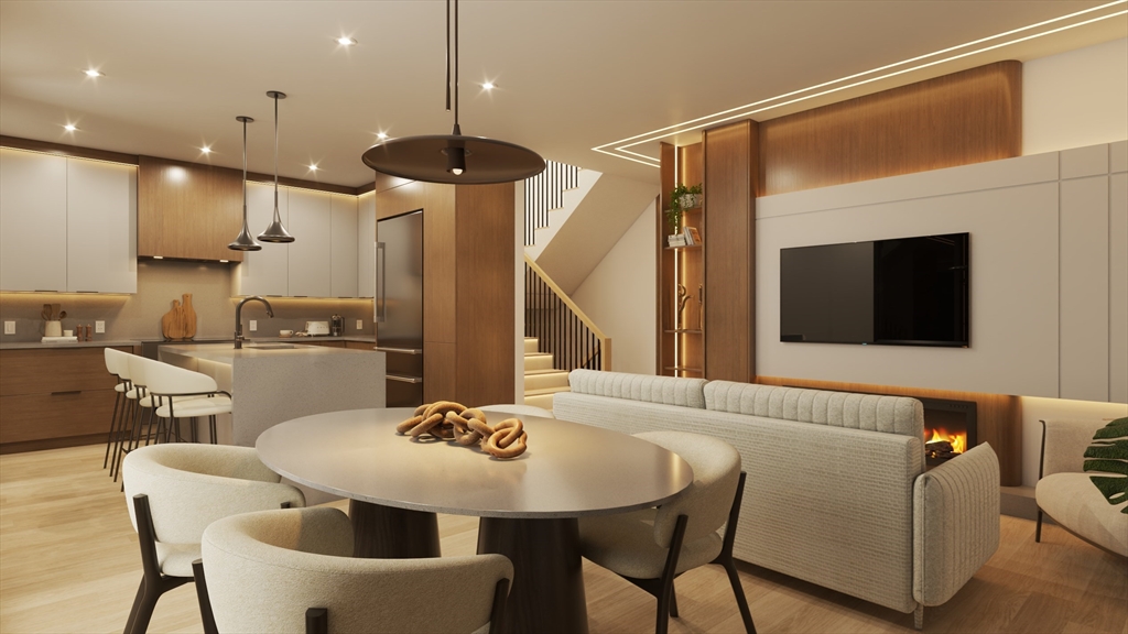 17 Algonquin Road, Unit 2 Newton, MA 02467 - Photo 15 of 18 a kitchen with a table chairs sink and microwave