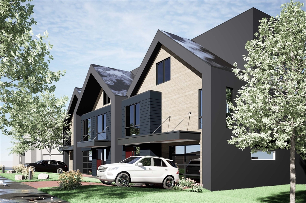 17 Algonquin Road, Unit 2 Newton, MA 02467 - Photo 18 of 18 a car parked in front of a house