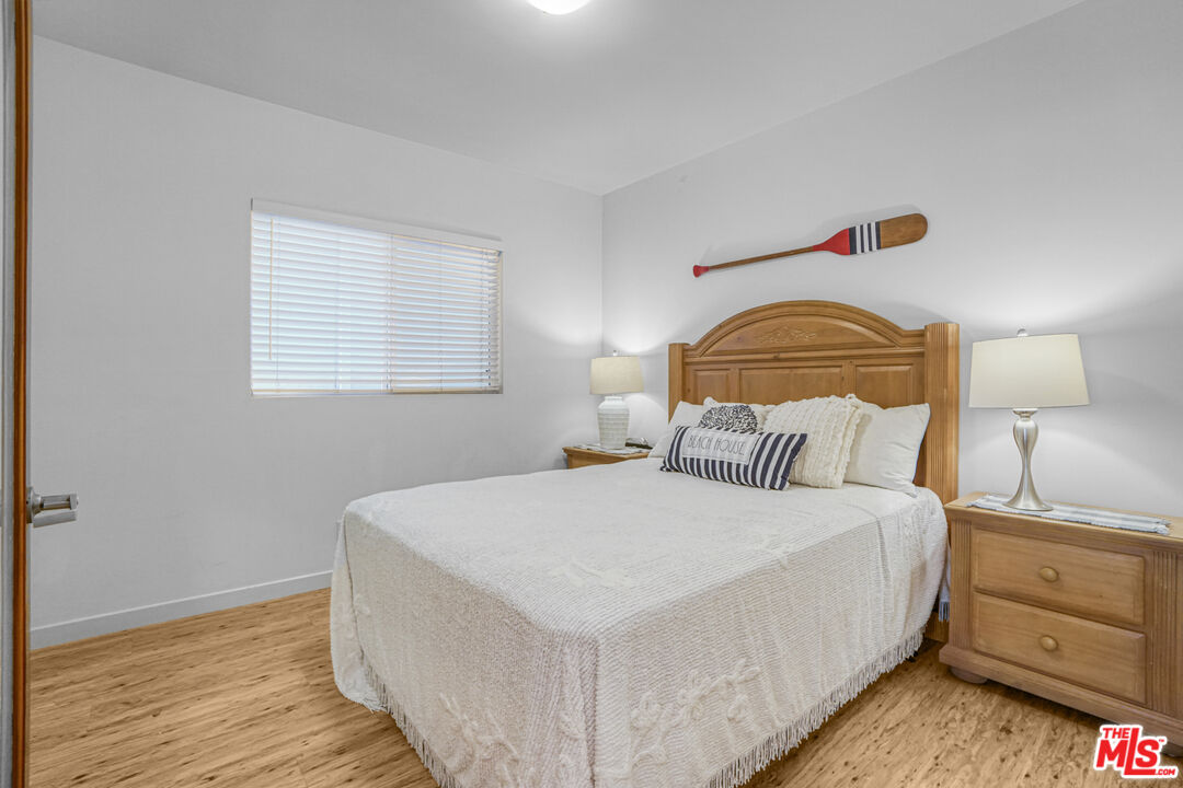 120 Fleet Street, Unit B Marina del Rey, CA 90292 - Photo 22 of 32 a bedroom with a bed and a night stand