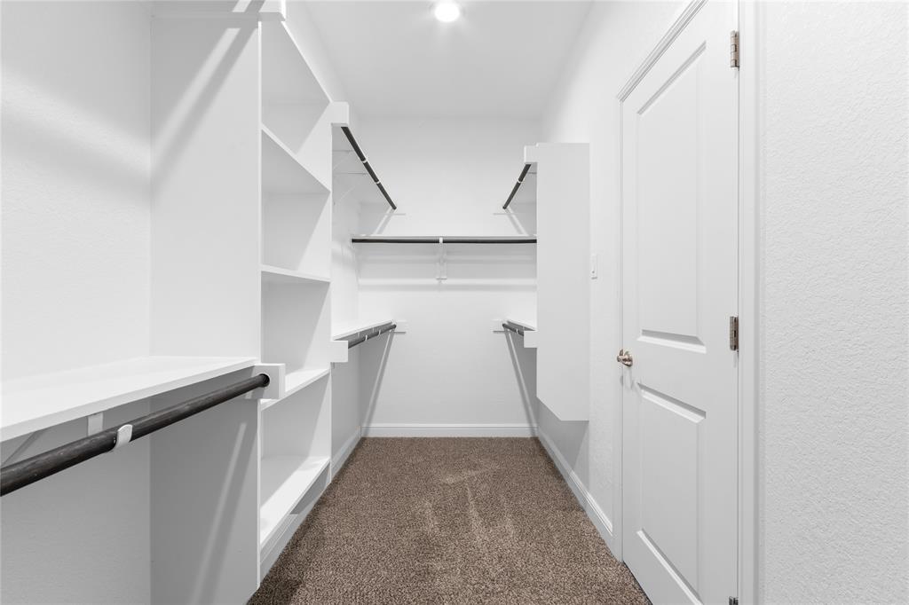 1045 Kirkham Way Fort Worth, TX 76247 - Photo 16 of 36 Master walk in closet