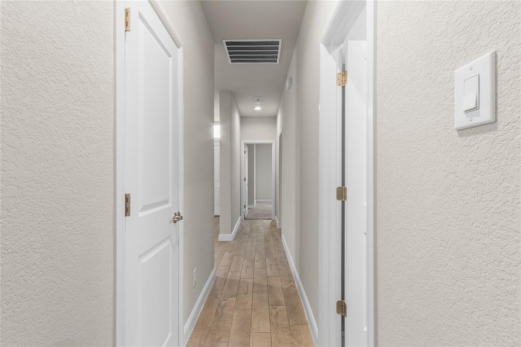 1045 Kirkham Way Fort Worth, TX 76247 - Photo 17 of 36 Hallway to bedrooms