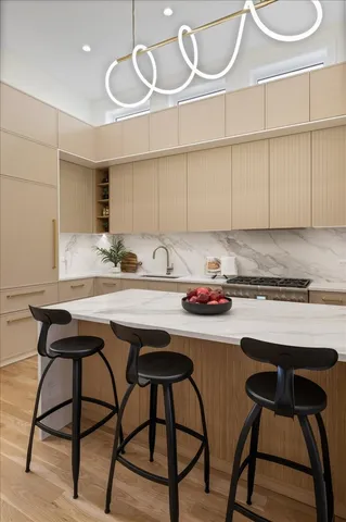 a bathroom with a sink and mirror