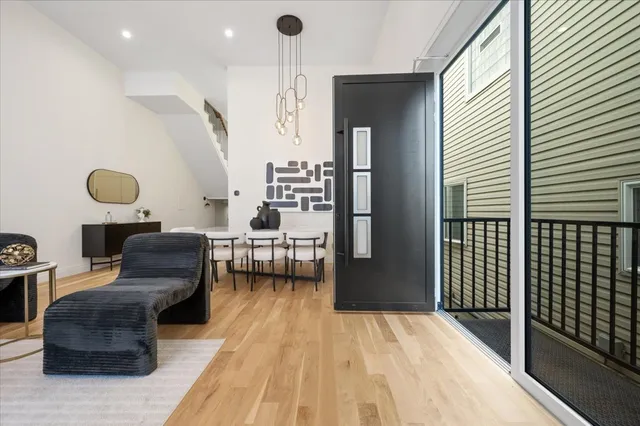 a living room with furniture and a rug