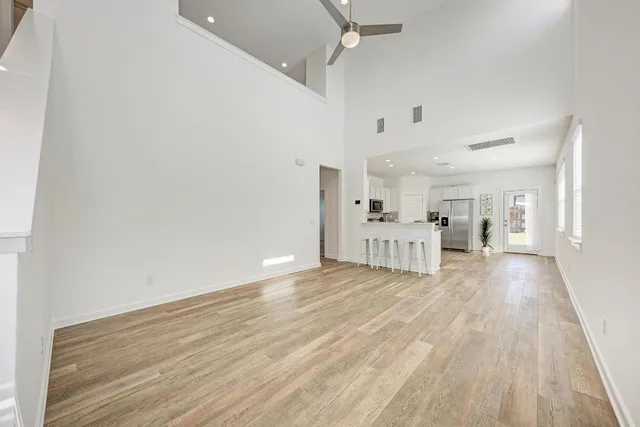 a view of a livingroom with wooden floor