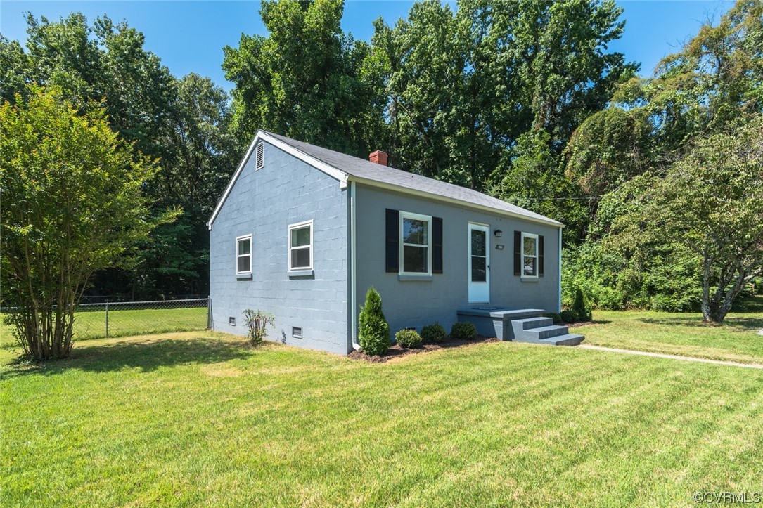 2441 Osborne Road Chester, VA 23831 - Photo 2 of 29 a view of a house with a backyard and a tree