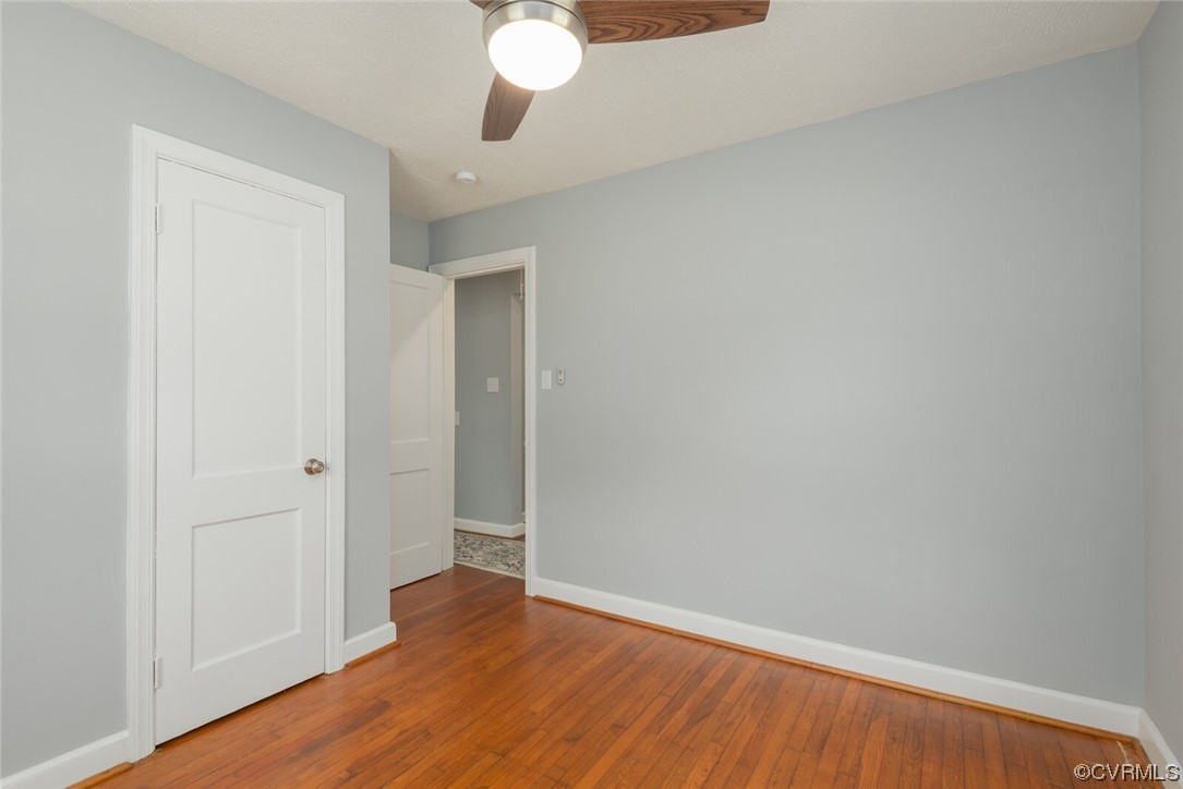 2441 Osborne Road Chester, VA 23831 - Photo 22 of 29 a view of an empty room with wooden floor