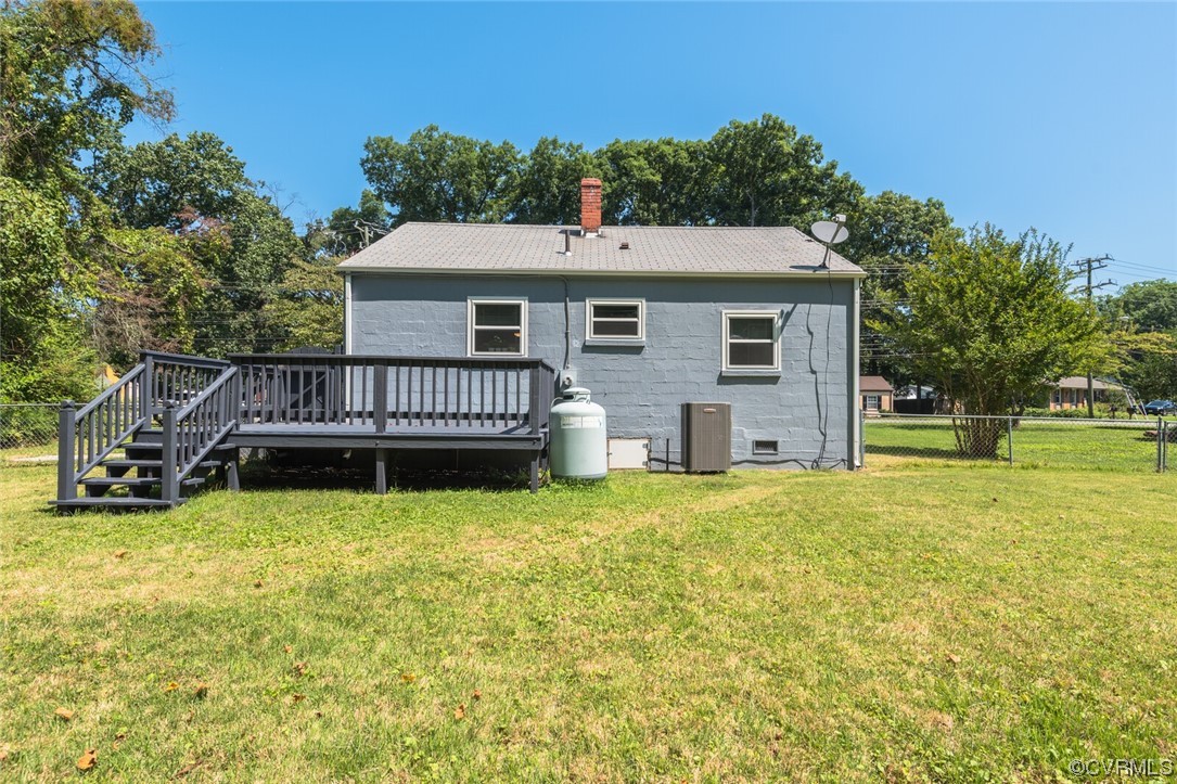 2441 Osborne Road Chester, VA 23831 - Photo 25 of 29 a view of a house with a yard and deck