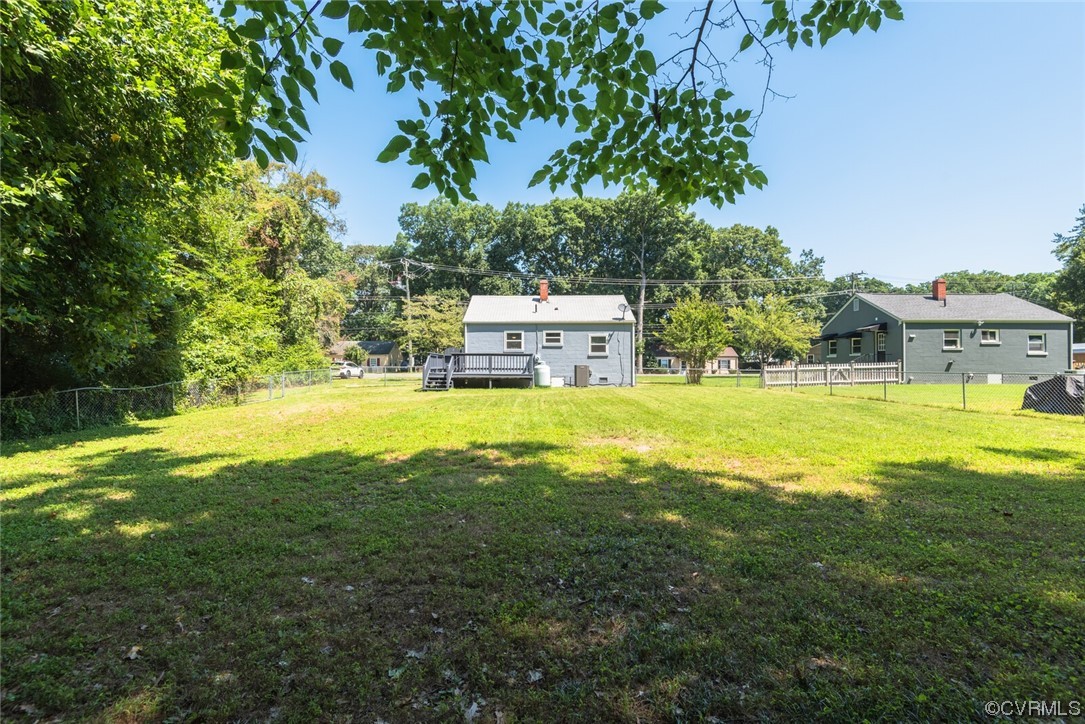 2441 Osborne Road Chester, VA 23831 - Photo 28 of 29 a swimming pool with trees in the background