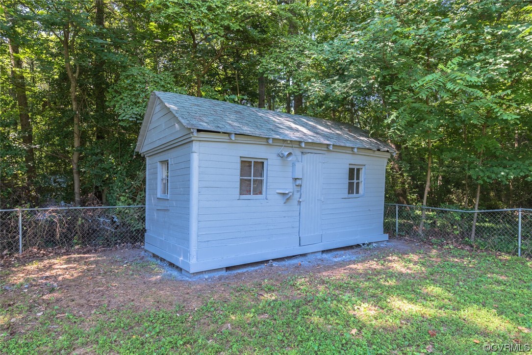 2441 Osborne Road Chester, VA 23831 - Photo 29 of 29 a backyard of a house with lots of green space