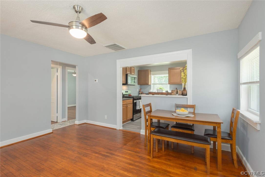 2441 Osborne Road Chester, VA 23831 - Photo 8 of 29 a workspace with wooden floor