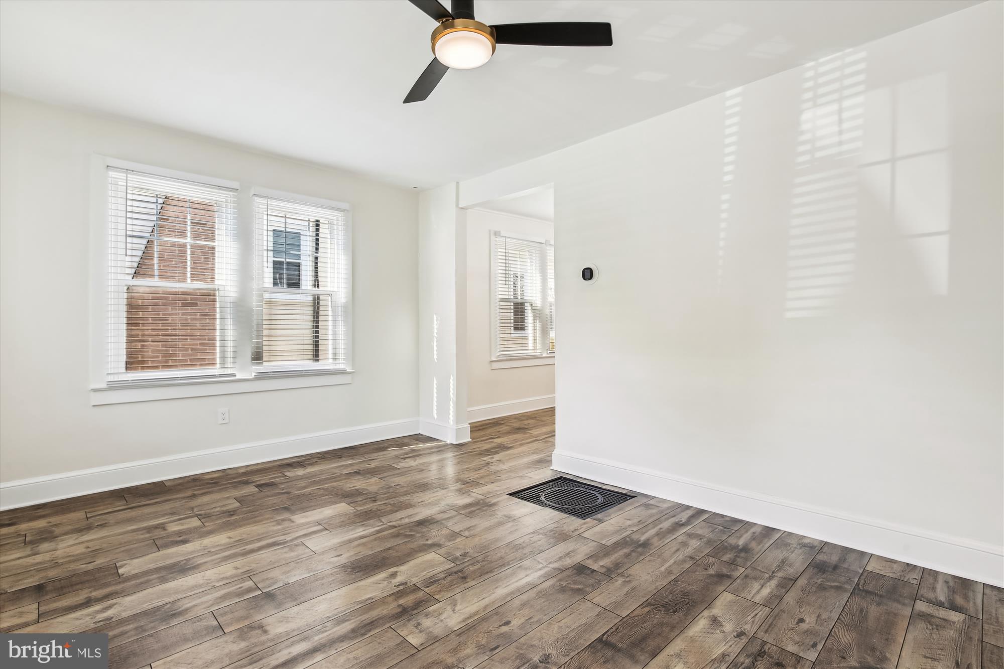3107 9th Road North Arlington, VA 22201 - Photo 12 of 34 a view of empty room with wooden floor and fan