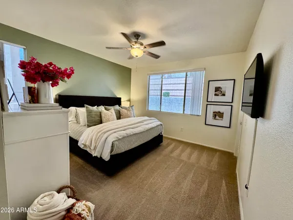 a living room with furniture and a window