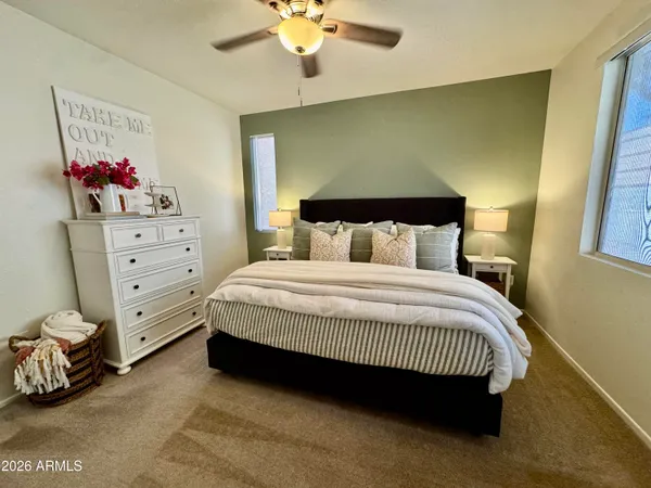 a view of a swimming pool and a chairs
