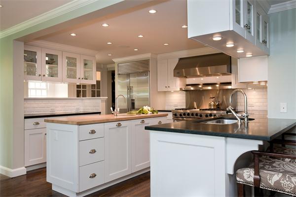 46 Yarmouth Road Wellesley, MA 02481 - Photo 4 of 11 a kitchen with stainless steel appliances granite countertop a sink stove and cabinets