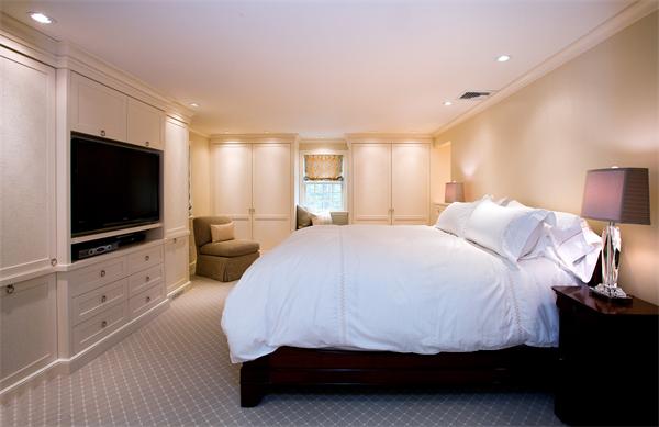 46 Yarmouth Road Wellesley, MA 02481 - Photo 9 of 11 a bedroom with a bed and a flat screen tv