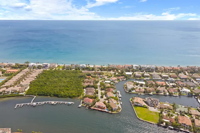 an aerial view of a house with a swimming pool