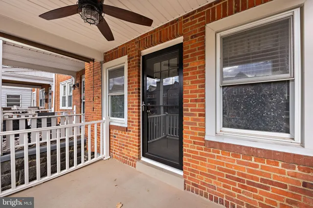 a view of a porch of a house