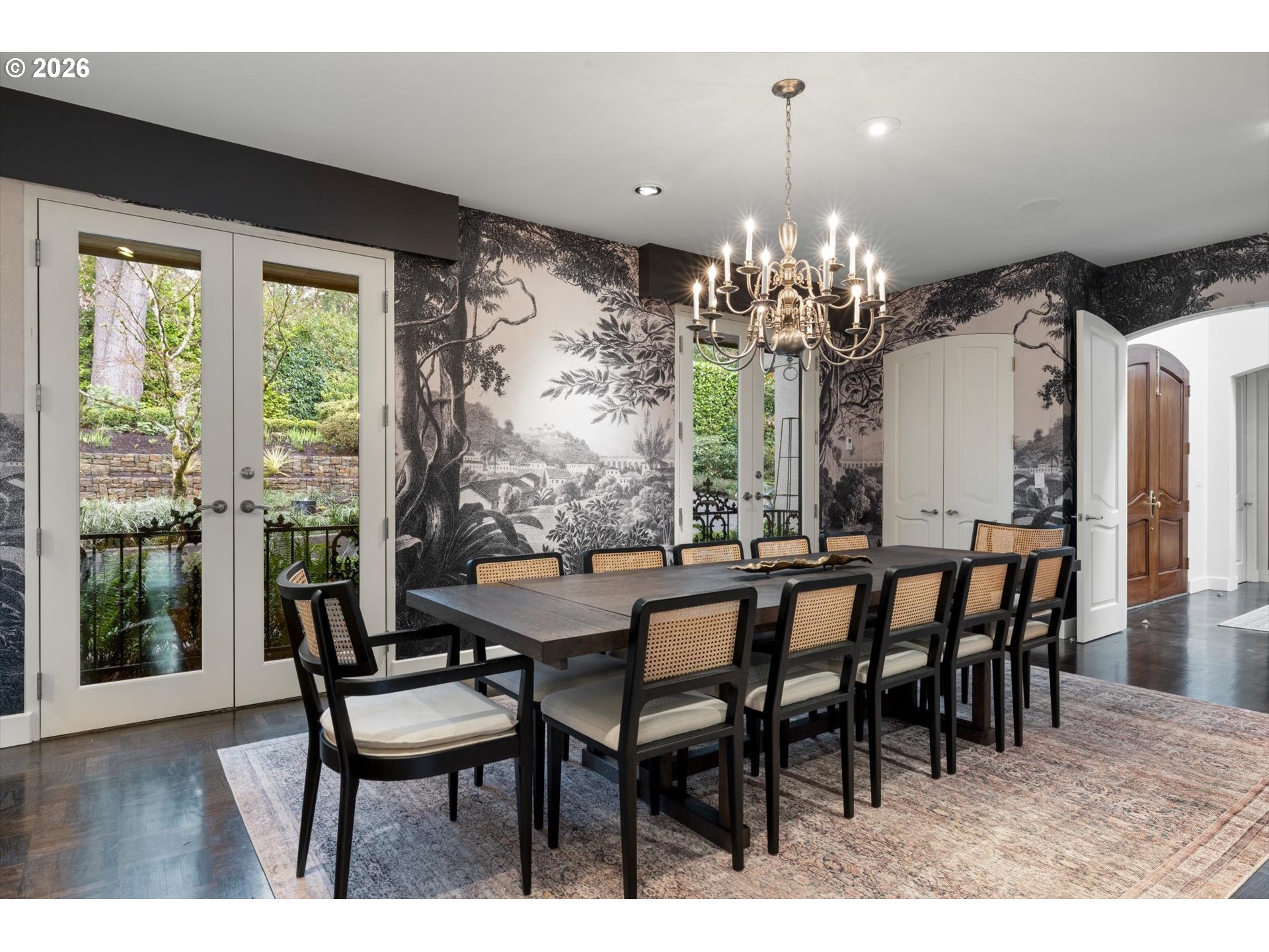 1616 South Greenwood Road Portland, OR 97219 - Photo 15 of 48 a dining room with furniture a chandelier and wooden floor