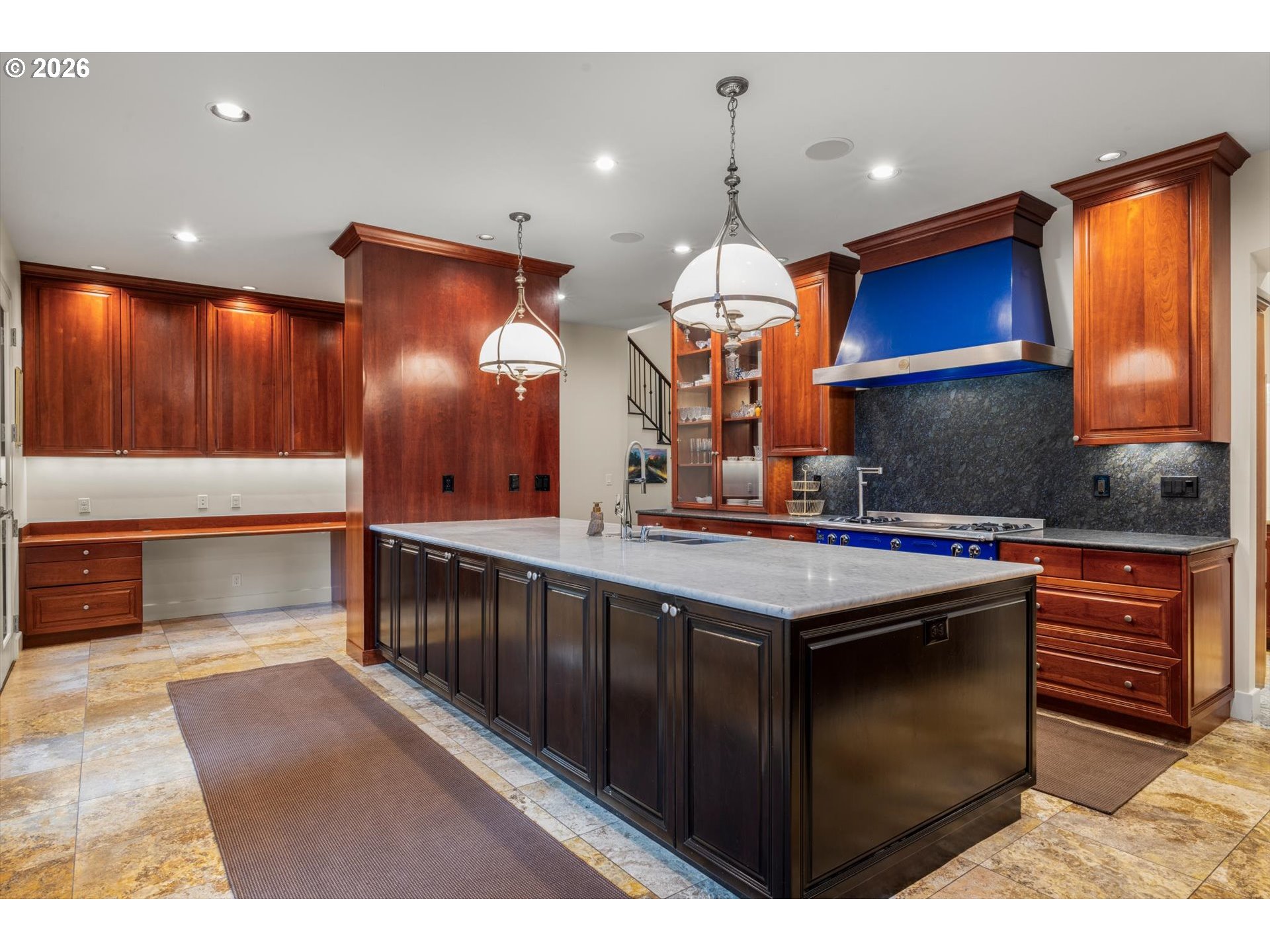 1616 South Greenwood Road Portland, OR 97219 - Photo 23 of 48 a kitchen with stainless steel appliances granite countertop a sink a stove and a wooden floors