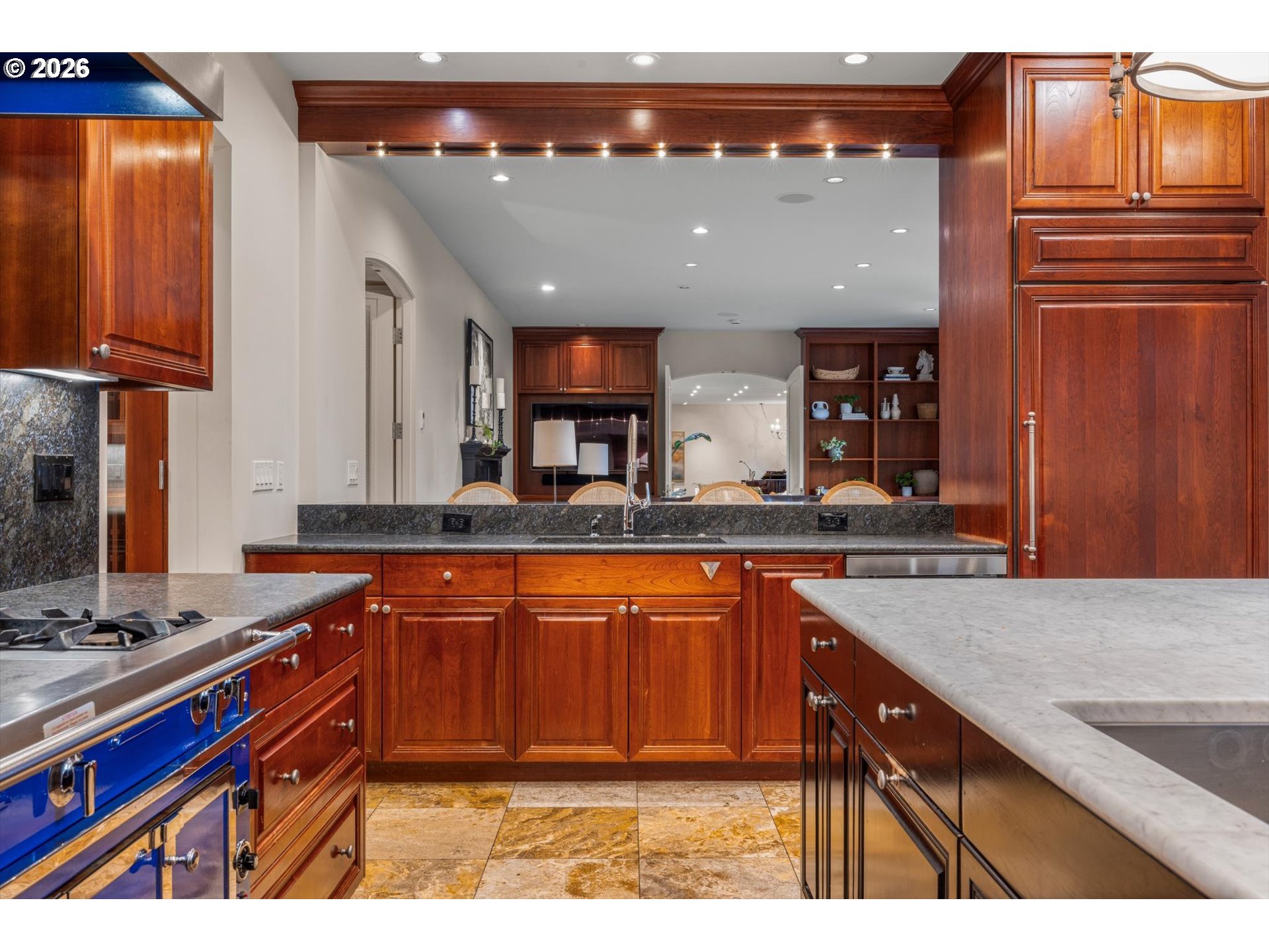 1616 South Greenwood Road Portland, OR 97219 - Photo 26 of 48 a kitchen with stainless steel appliances granite countertop a sink stove and cabinets