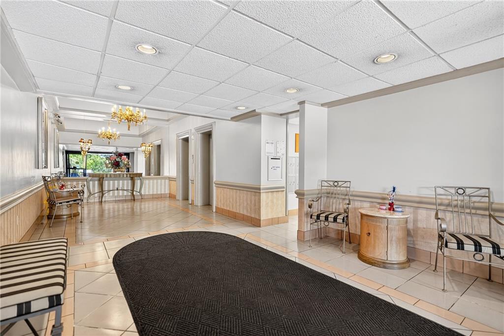 2120 Greentree Road, Unit 610E Pittsburgh, PA 15220 - Photo 23 of 23 a living room with lots of furniture and view of kitchen