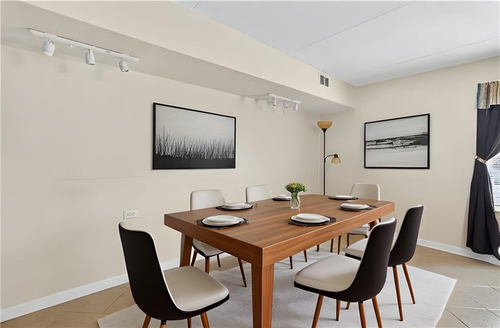 2120 Greentree Road, Unit 610E Pittsburgh, PA 15220 - Photo 7 of 23 a view of a dining room with furniture