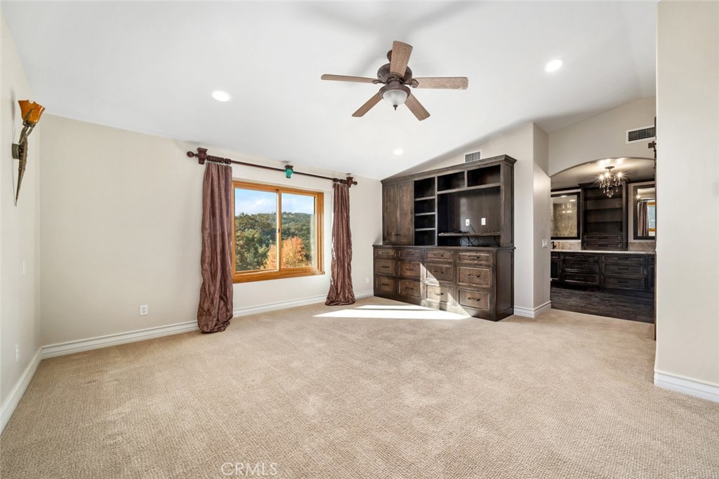 9170 Santa Lucia Road Atascadero, CA 93422 - Photo 19 of 60 a view of a livingroom with a ceiling fan and window