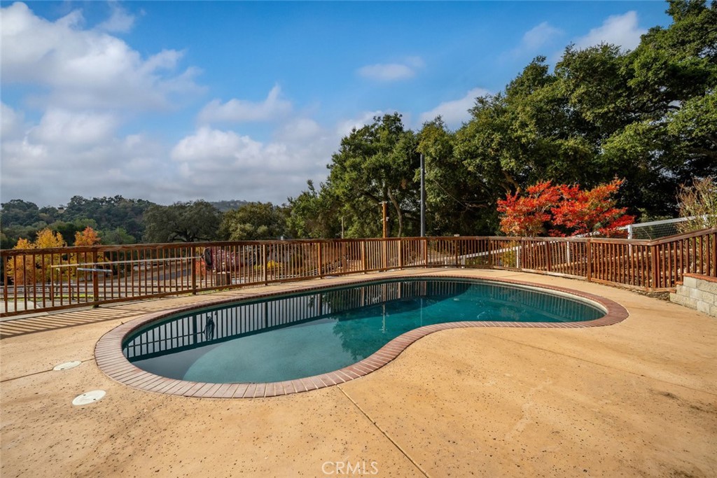 9170 Santa Lucia Road Atascadero, CA 93422 - Photo 44 of 60 a view of a swimming pool with a fountain