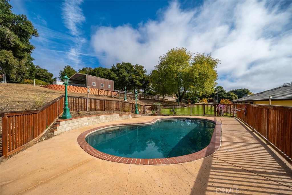 9170 Santa Lucia Road Atascadero, CA 93422 - Photo 45 of 60 a view of a swimming pool with outdoor seating