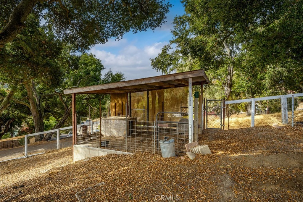 9170 Santa Lucia Road Atascadero, CA 93422 - Photo 46 of 60 a view of a chair and table on the wooden floor