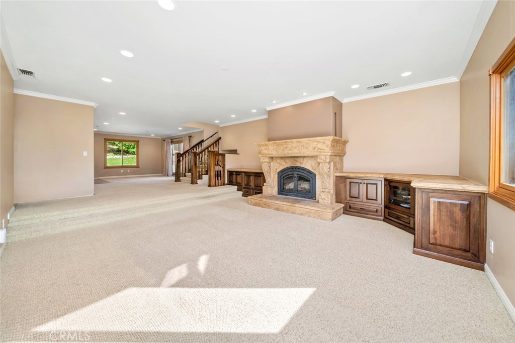 9170 Santa Lucia Road Atascadero, CA 93422 - Photo 8 of 60 a living room with furniture and a fireplace