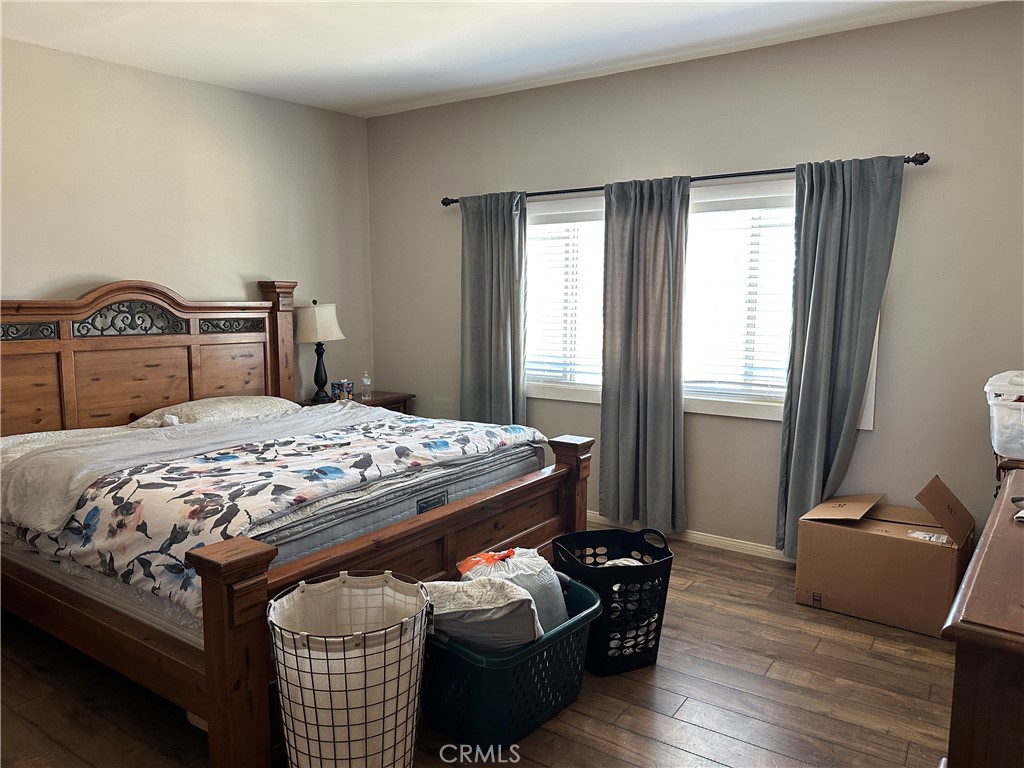 37380 Bohlen Road Anza, CA 92539 - Photo 5 of 10 a bedroom with a bed and wooden floor