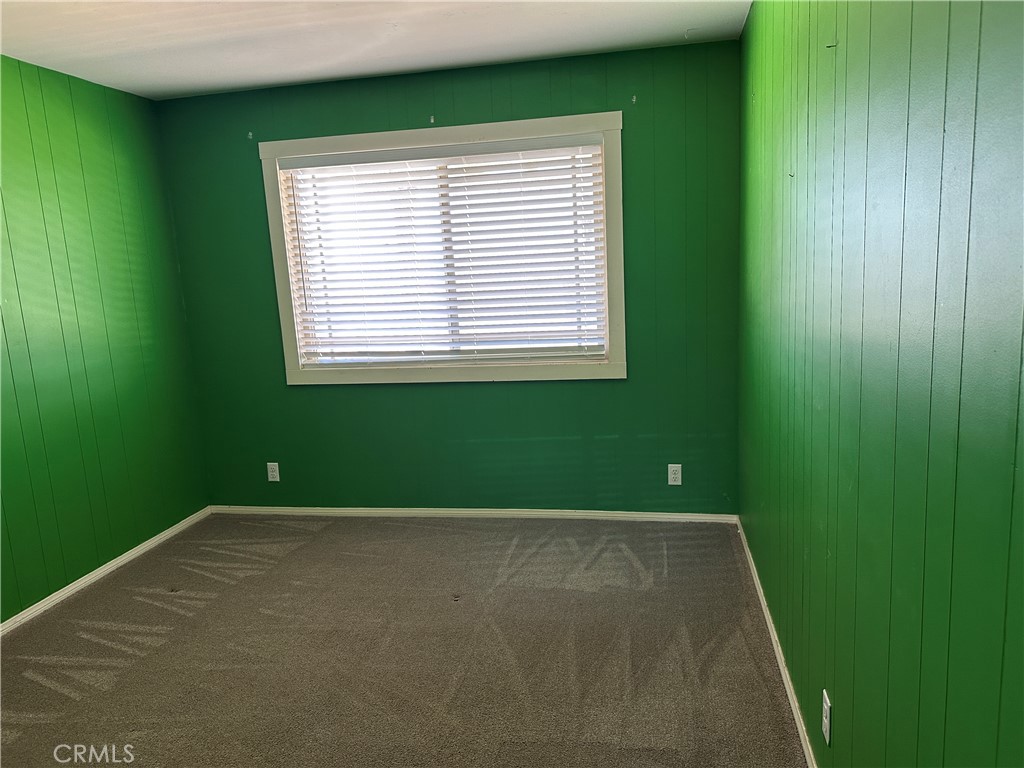 37380 Bohlen Road Anza, CA 92539 - Photo 6 of 10 a view of an empty room with a window and a ceiling fan