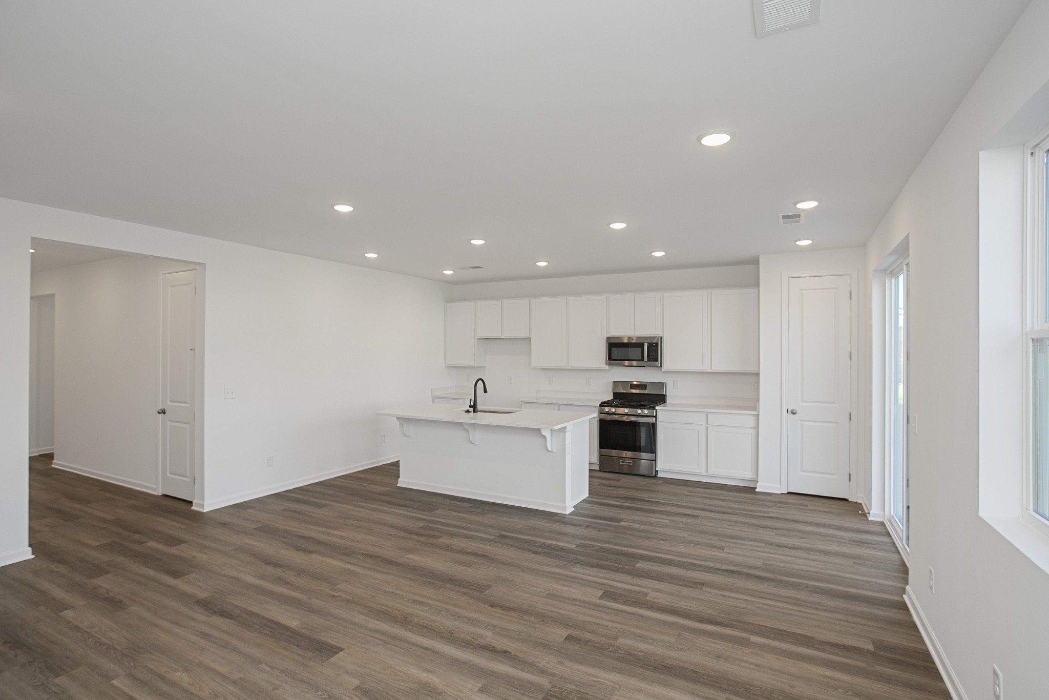 604 Maple Bend Dickson, TN 37055 - Photo 12 of 39 a view of kitchen with wooden floor
