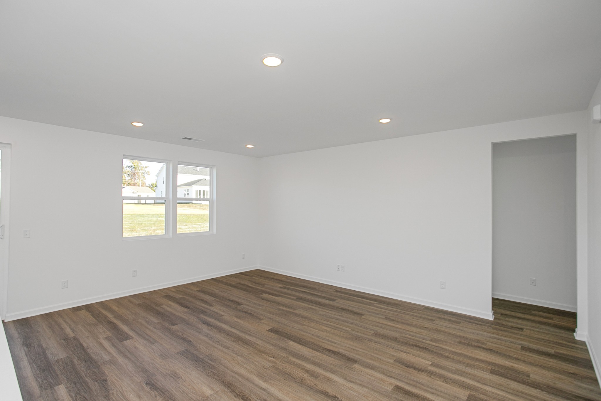 604 Maple Bend Dickson, TN 37055 - Photo 13 of 39 a view of empty room with wooden floor and fan