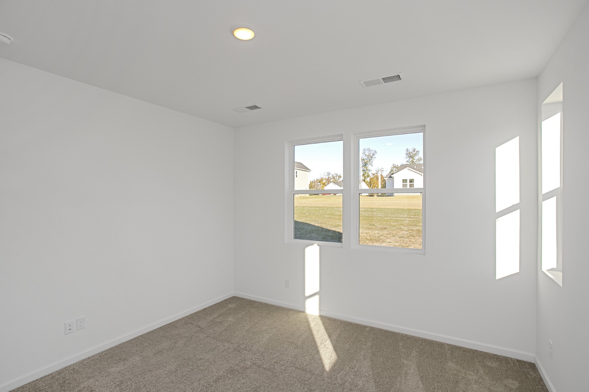 604 Maple Bend Dickson, TN 37055 - Photo 30 of 39 an empty room with windows