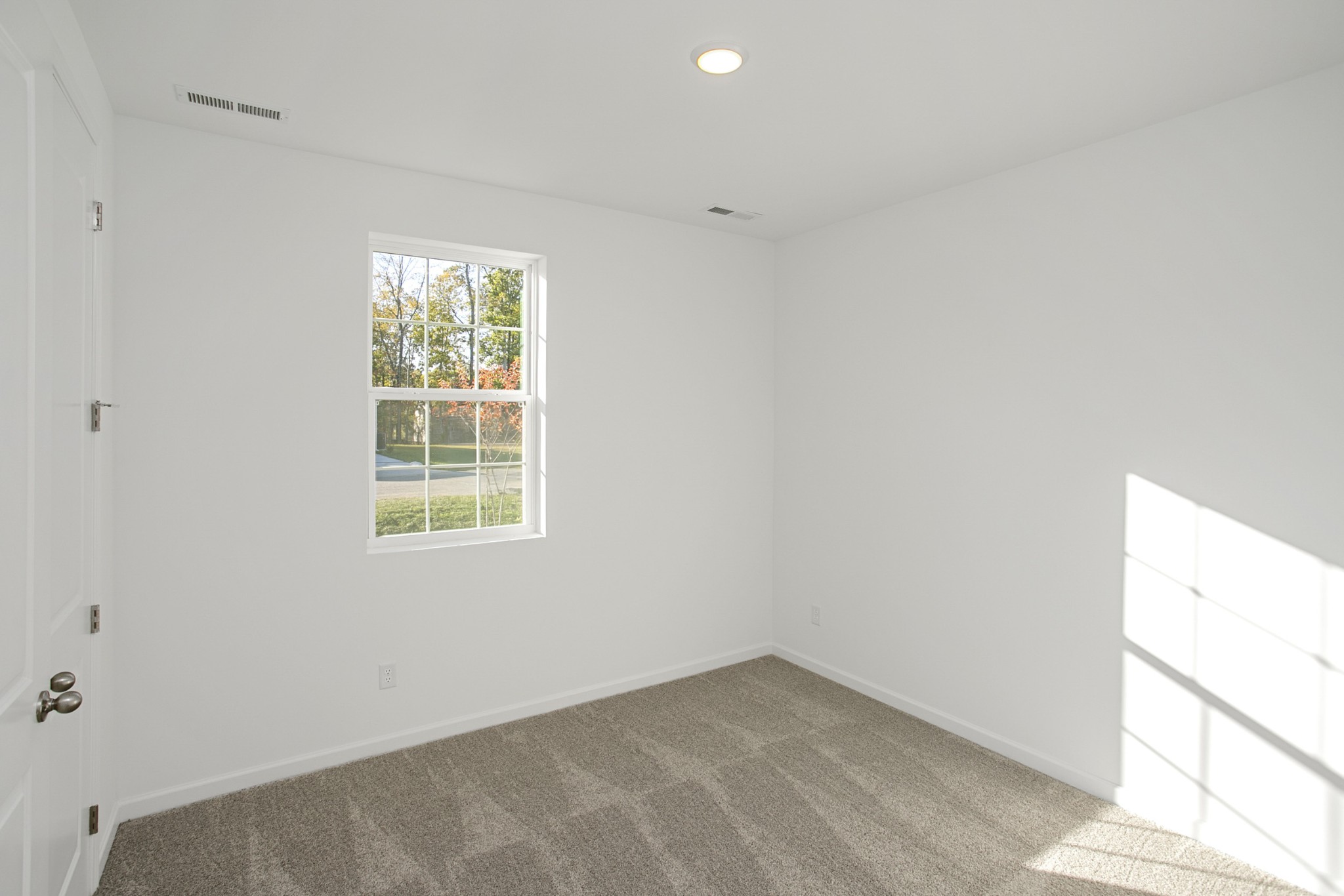 604 Maple Bend Dickson, TN 37055 - Photo 3 of 39 an empty room with a window