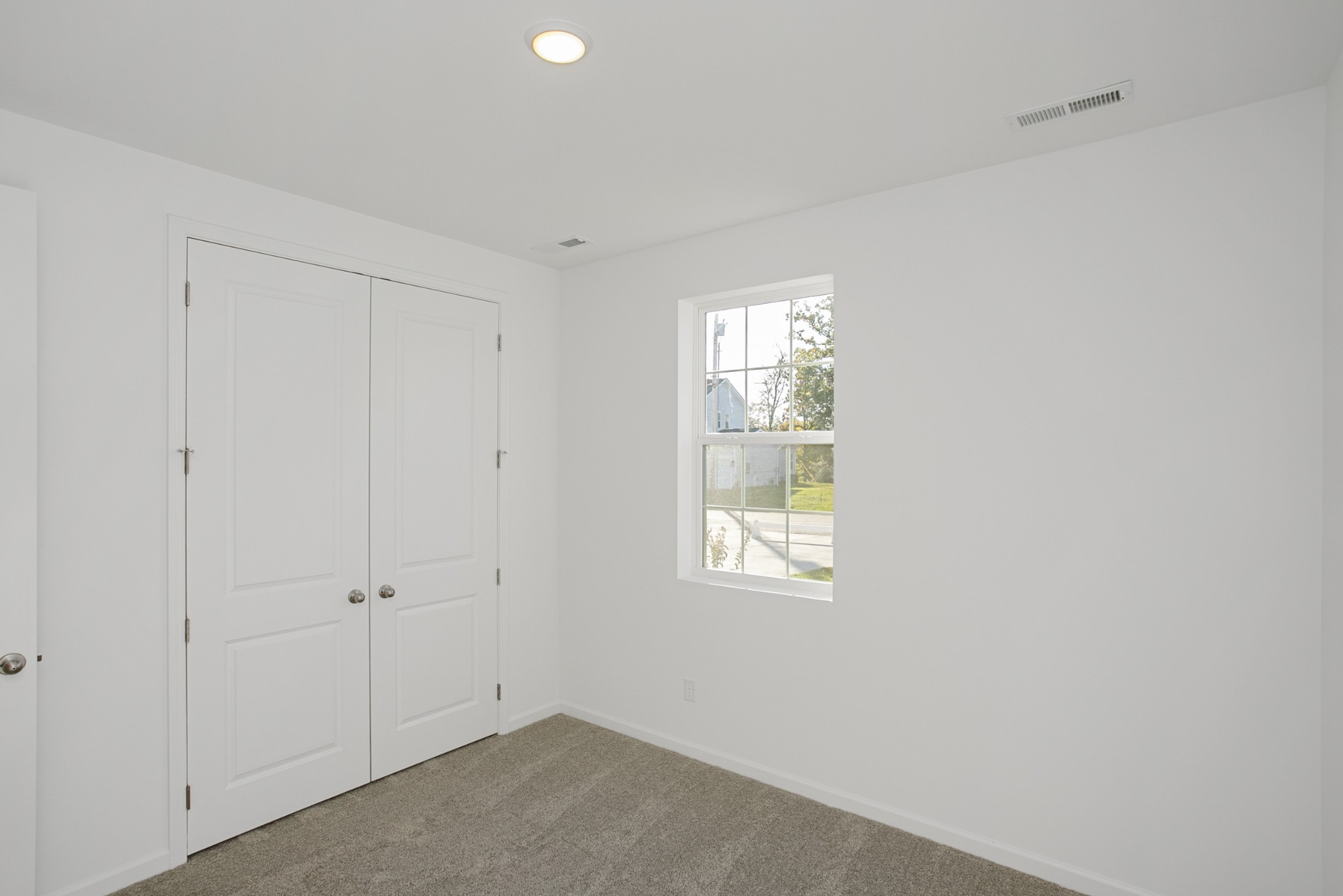 604 Maple Bend Dickson, TN 37055 - Photo 4 of 39 a view of an empty room with a window