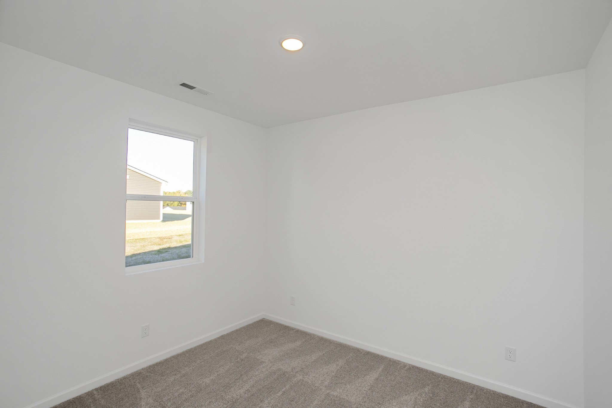 604 Maple Bend Dickson, TN 37055 - Photo 7 of 39 an empty room with a window