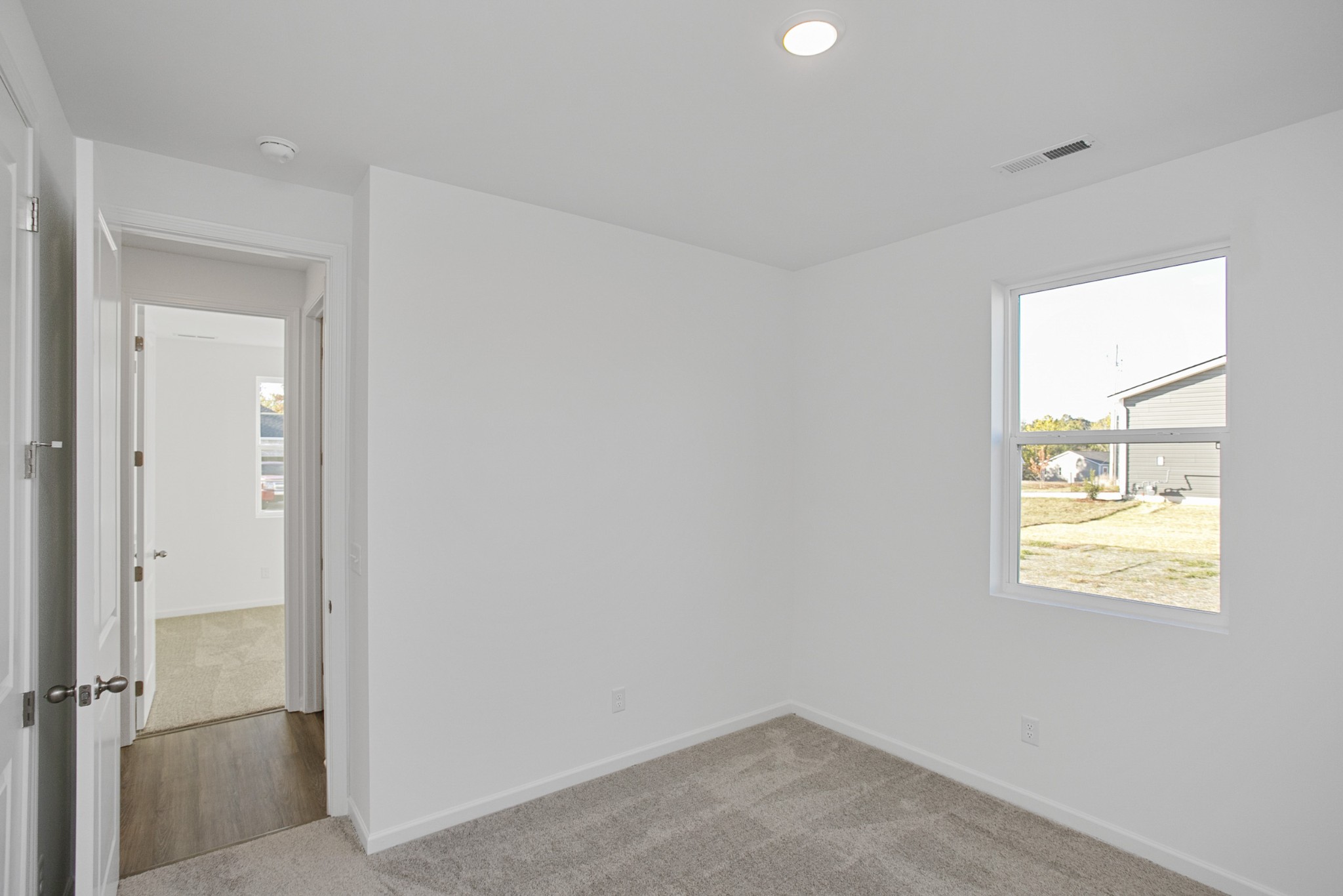 604 Maple Bend Dickson, TN 37055 - Photo 10 of 39 a view of an empty room and a window
