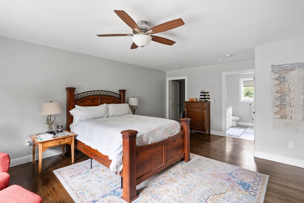 237 Glendale Road Northampton, MA 01062 - Photo 22 of 42 a bedroom with a bed and wooden floor
