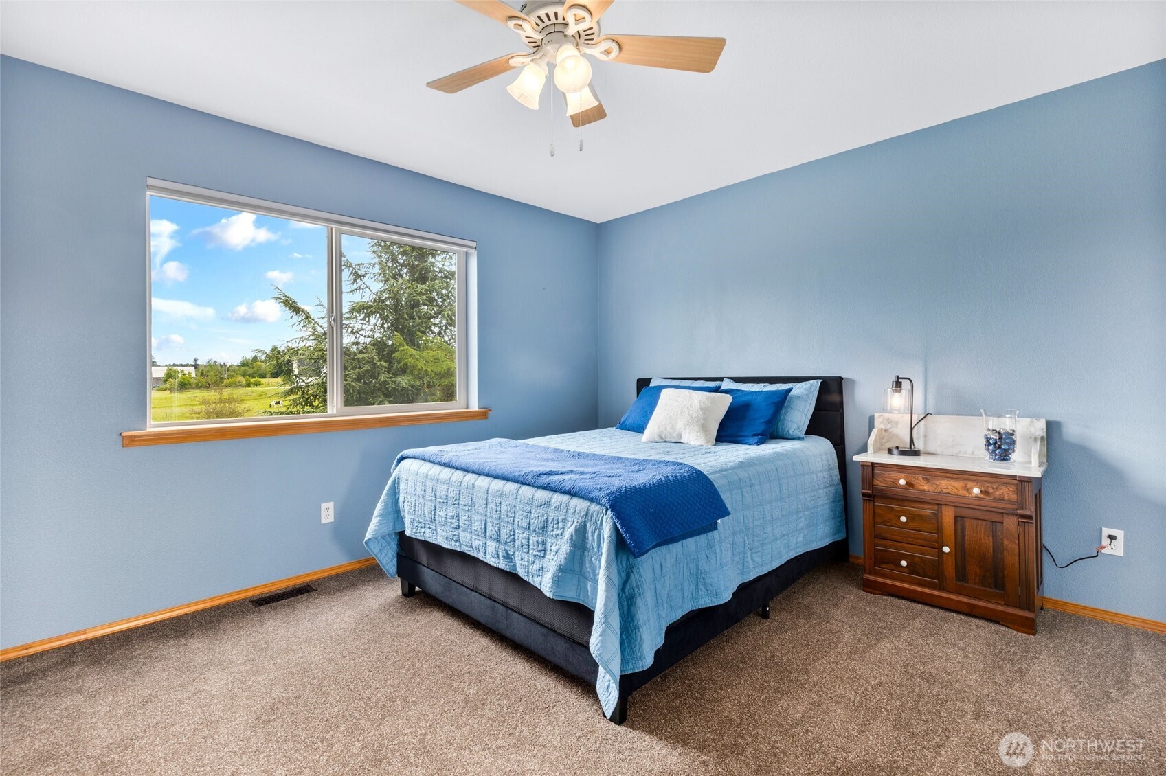 14419 Martinson Road Southeast Yelm, WA 98597 - Photo 21 of 39 a bedroom with a bed and window