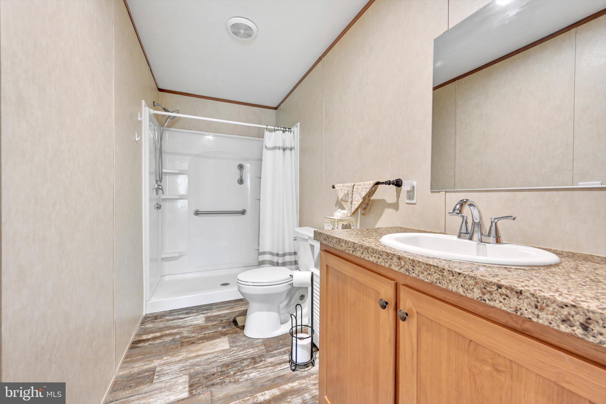 185 Weidler Lane Lititz, PA 17543 - Photo 15 of 25 a bathroom with a granite countertop sink toilet and shower